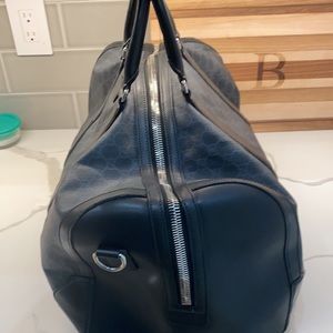Men’s Gucci Duffle bag Numbers read: 478323 520981